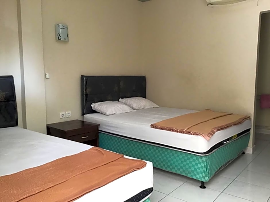 OYO 90520 Kuta Family Guest House