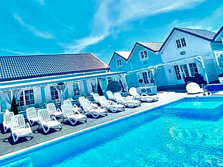 Domki BALTIC FAMILY basen kidsclub rowery