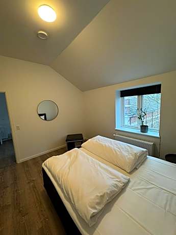 Deluxe One-Bedroom Apartment with Garden View