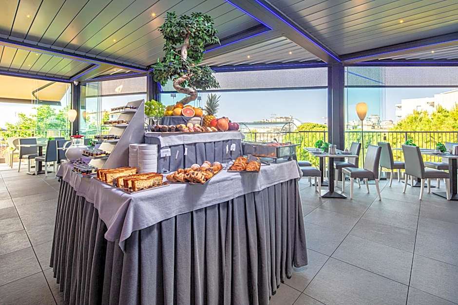 Monaco Suites Hotel