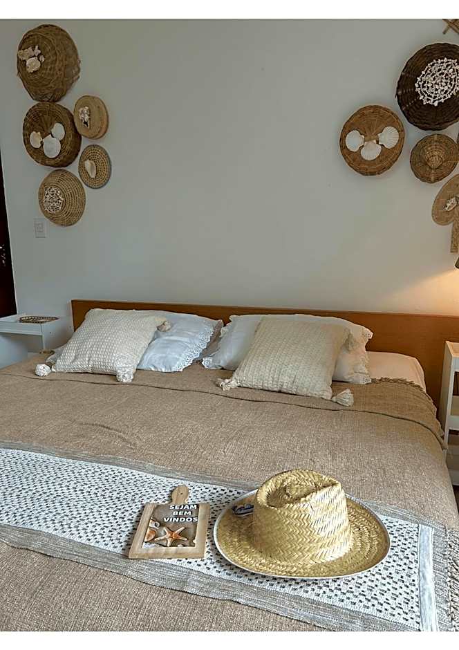 Casa Ilha| beira mar, piscina aquecida, 4 suítes