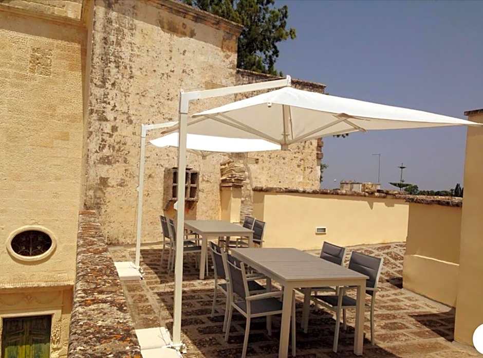 Palazzo de Carlo e il parco dei 7 pozzi