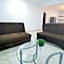 "Spacious Suite with 4 Bedrooms and Amenities"