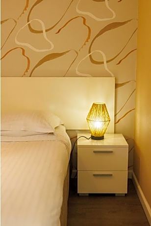 One-Bedroom Apartment (2 Adults + 2 Children)