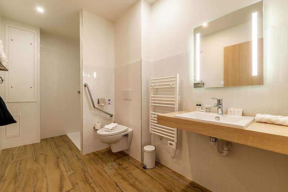 Hôtel Échappée en Baie - Parking privé gratuit dont forfaits bornes électriques réservable