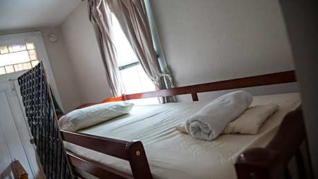 Bed in 5 bed mixed dormitory room with private bathroom
