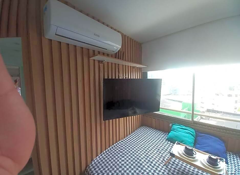 Studio aconchegante em frente a praia