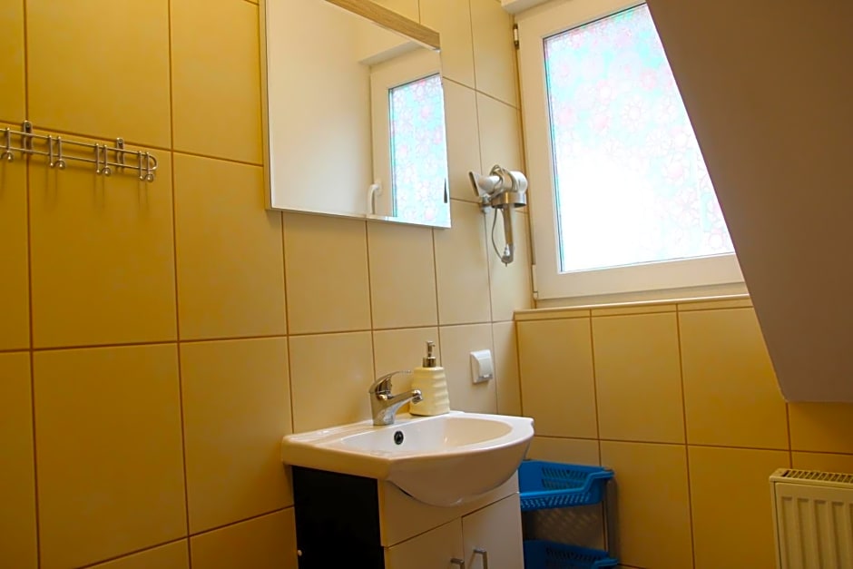 Sztil - Apartamenty i drewniane domki