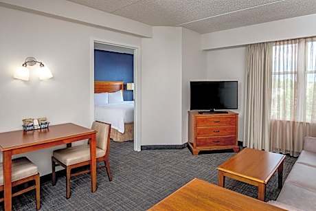 One-Bedroom Queen Suite with 2 Queen Beds, Sofa Bed, Full Kitchen, Living Space