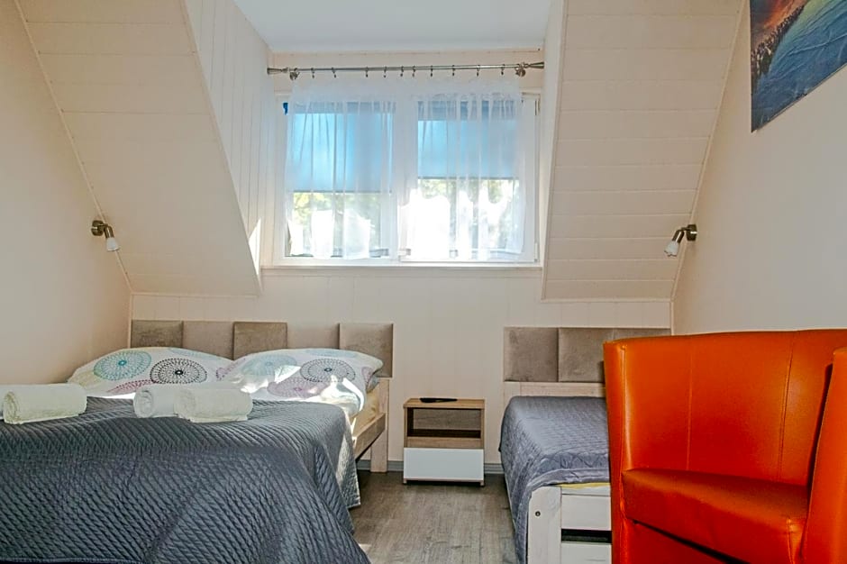 Sztil - Apartamenty i drewniane domki