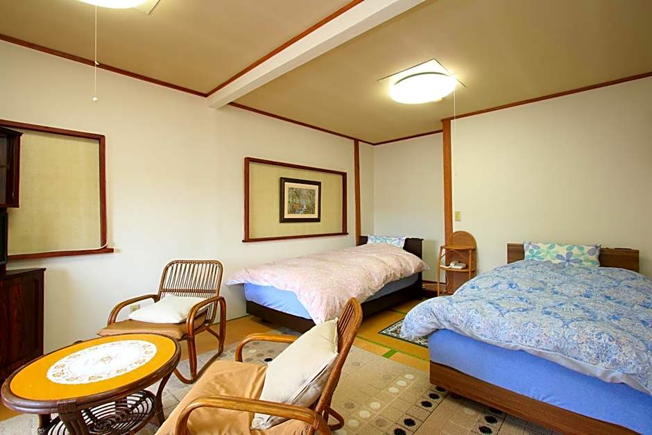 Photo 1 of 3 of Twin Room with Shared Bathroom