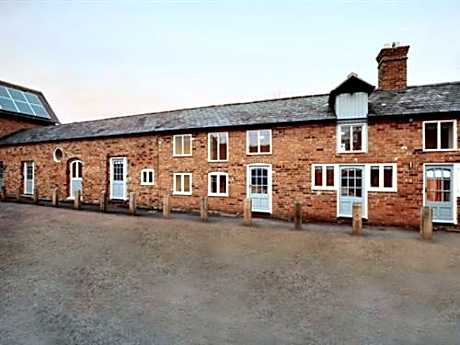 THE COACHING BARNS