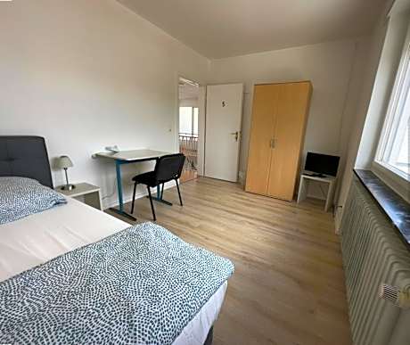 Single Room with Shared Shower and Toilet