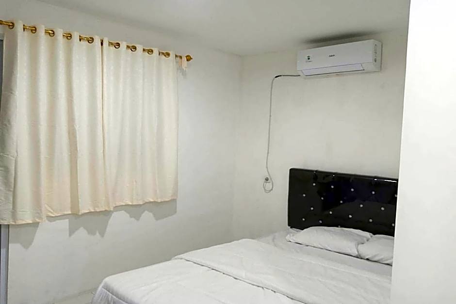 Capital O 93728 Guest House Cemara