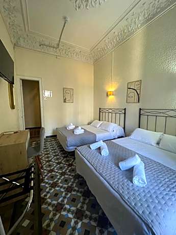 Quadruple Room with Private Bathroom