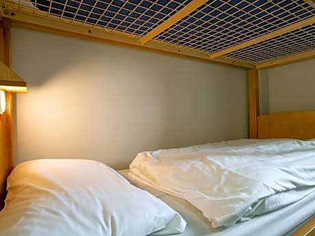 Bunk Bed in Female Dormitory Room with Shared Bathroom