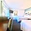Bluebird Day Inn & Suites
