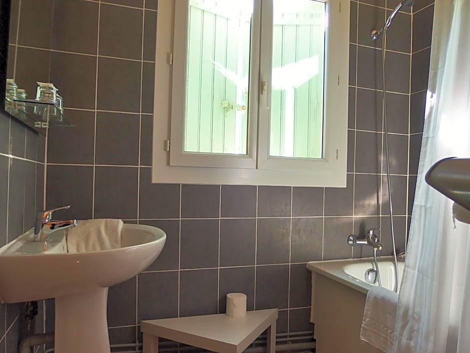 Au Saint Roch - Hôtel et Jardin