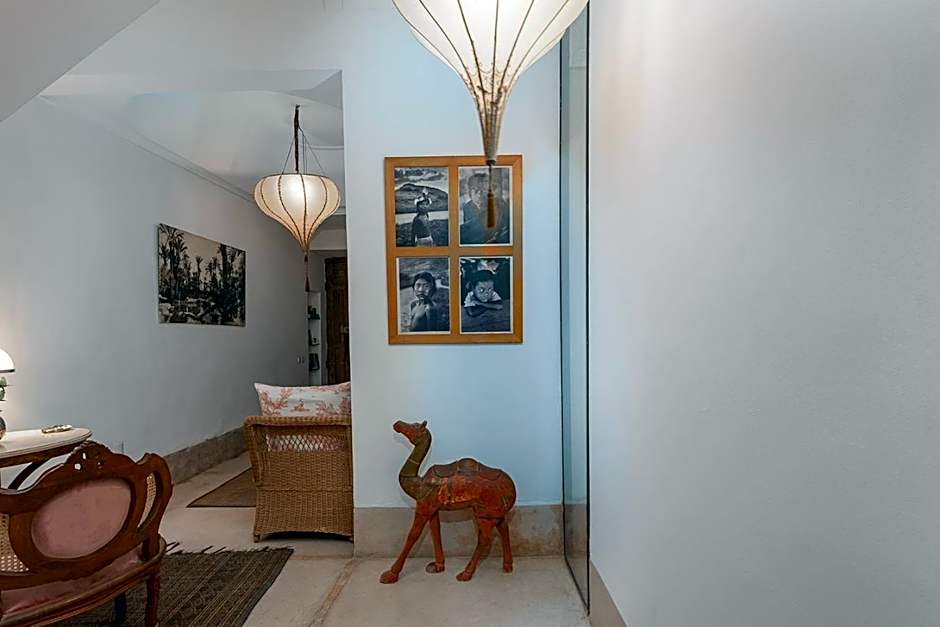 Riad Le J