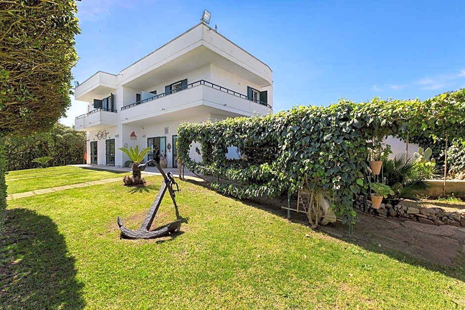 Residence Punta Cassano - In piscina sulla spiaggia di sabbia