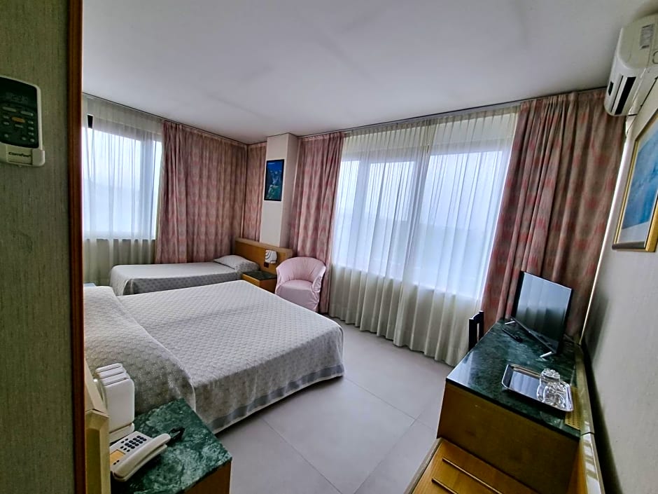 Photo 1 of 2 of Triple Room