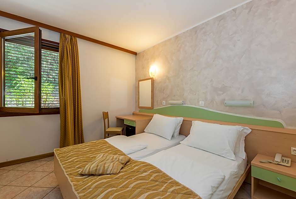 Photo 1 of 3 of DOUBLE SINGLE USE ECONOMY ROOM WITH STREET VIEW