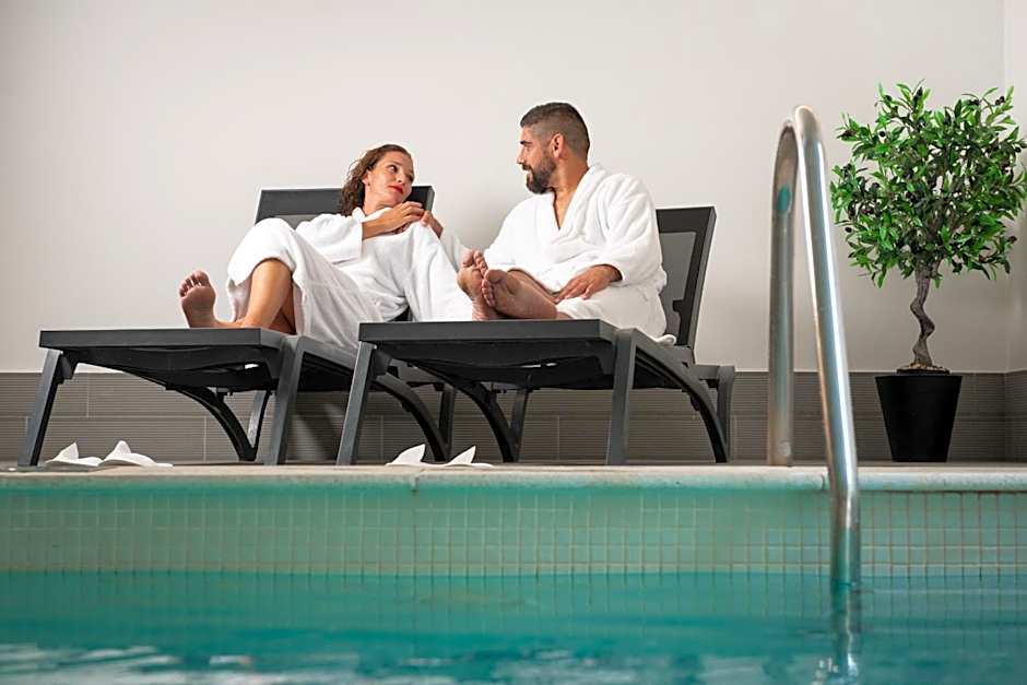 Essence Inn Marianos Hotel