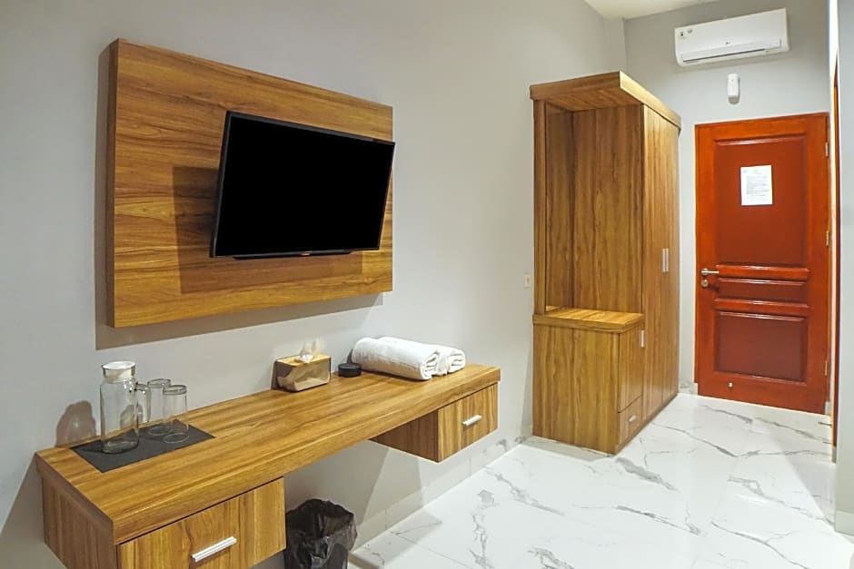 SUPER OYO Capital O 92066 Papakoel Hotel & Cafe