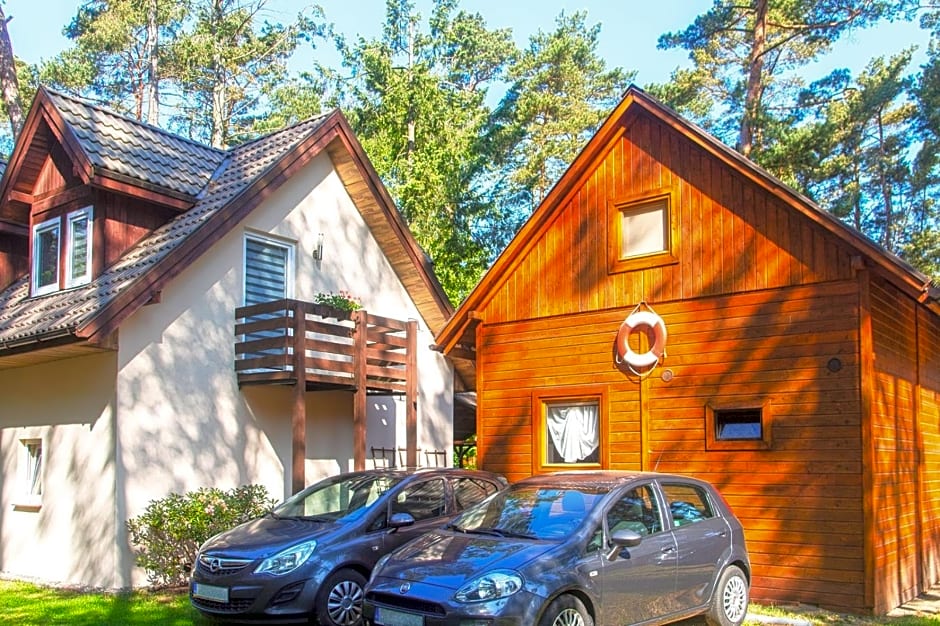 Sztil - Apartamenty i drewniane domki
