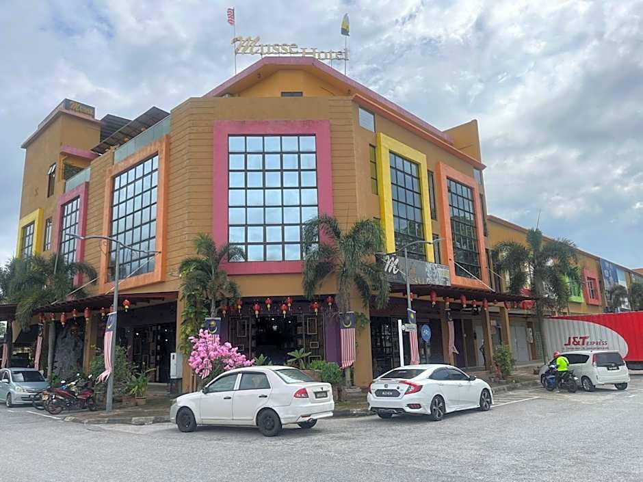 Photo 1 of 50 of Capital O 89333 Musse Hotel