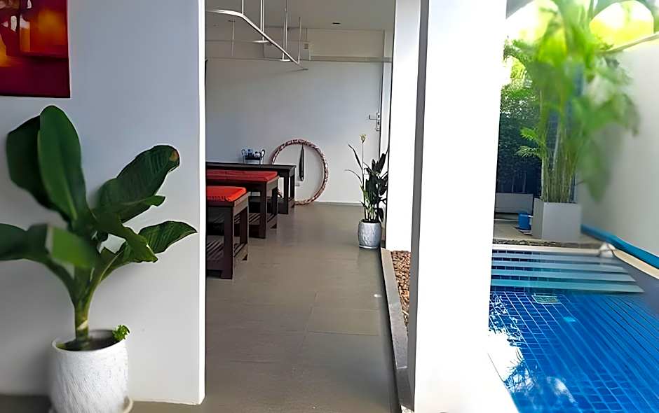 One World One Home Naiharn Hotel