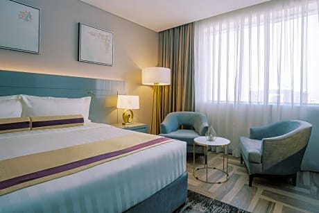 Deluxe King Room with Balcony”