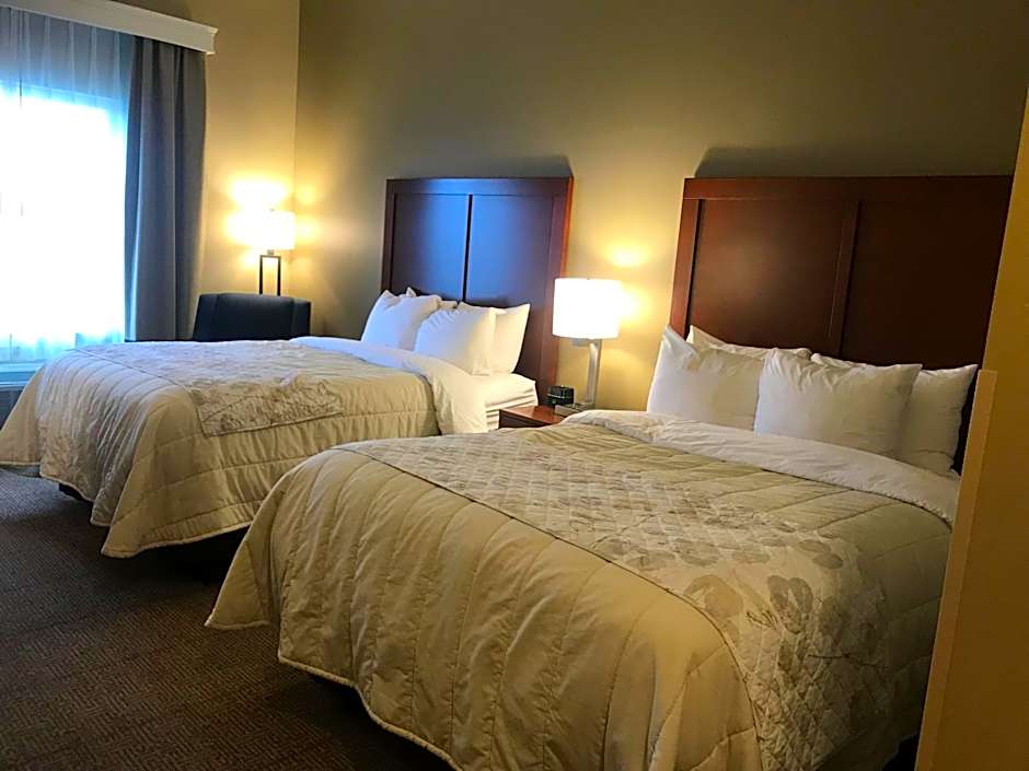 Photo 1 of 10 of Queen Suite with Two Queen Beds and Sofa Bed