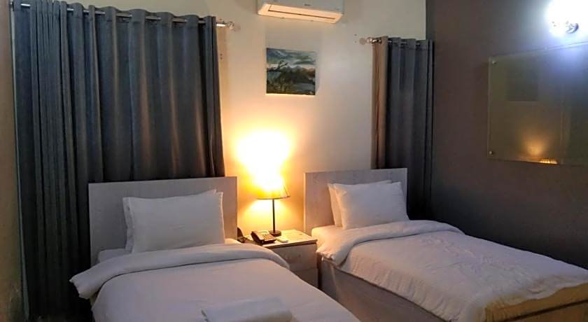 Hotel Inn – Karachi, OK
