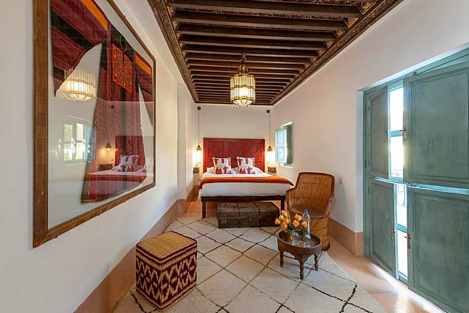 Riad Le J