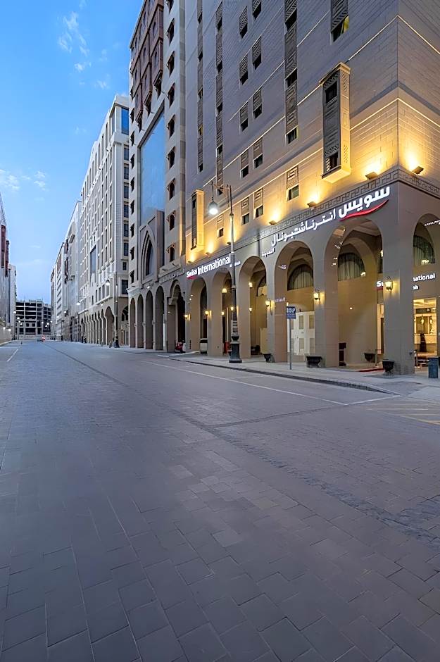 Swiss international Al Madina