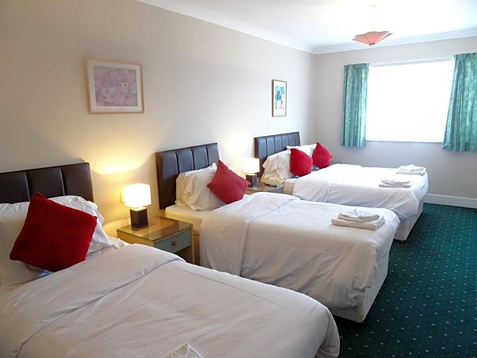 Photo 1 of 9 of Quadruple Room