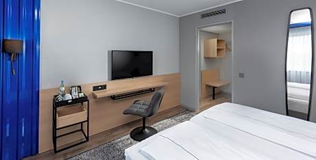 Family Suite with Two Single Beds and  Sofa