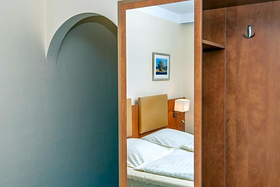 Photo 1 sur 5 de Triple Room