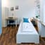 Zentral gelegene Zimmer mit Gemeinschaftsbad und Küche