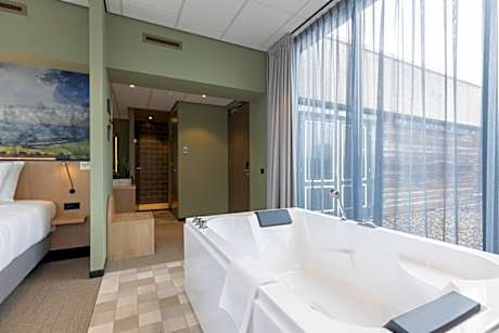 Suite with bath and balcony