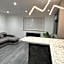 Under New Top Rated Management I Stylish 2BR Apartments I Central Hub I Free Parking I Work Ready Amenities