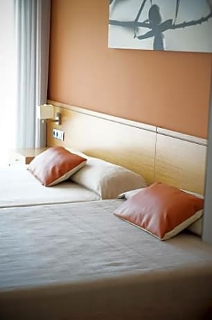 Triple Room (2 Adults + 1 Child)