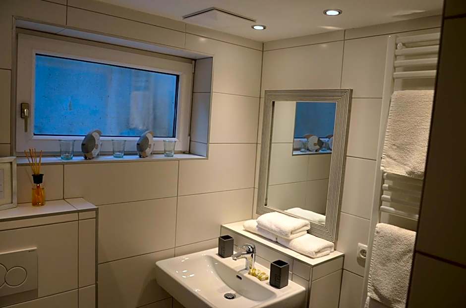 Dahoam by Sarina - Rooms & Suites