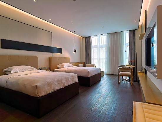 Yuhai Moqi Hotel (Hangzhou Bay Financial Plaza)