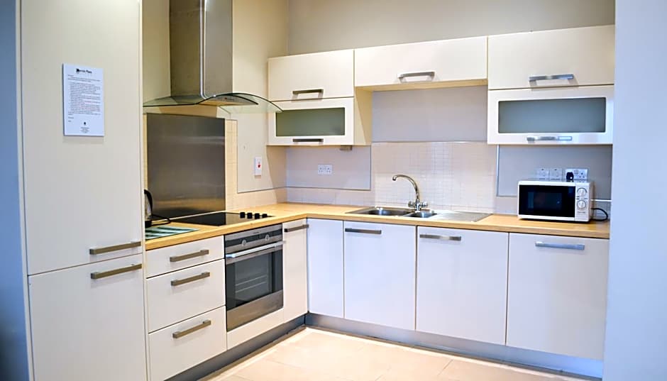 Carrick Plaza Suites and Apartments