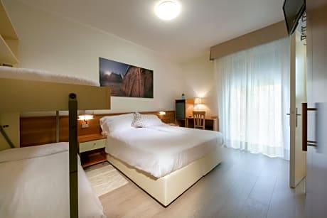 Quadruple Room (2 Adults + 2 Children)