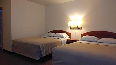 Family Room with Two Queen Beds and One Futon