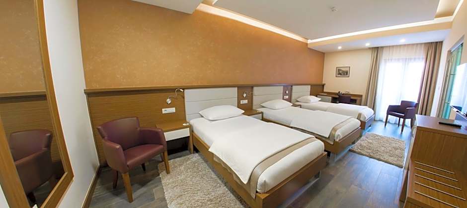 Foto 1 di 7 di Triple Room