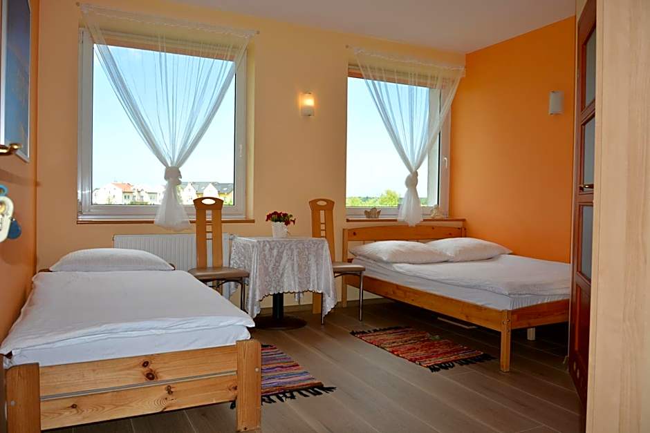 Słoneczny Dom pokoje i apartament na wynajem